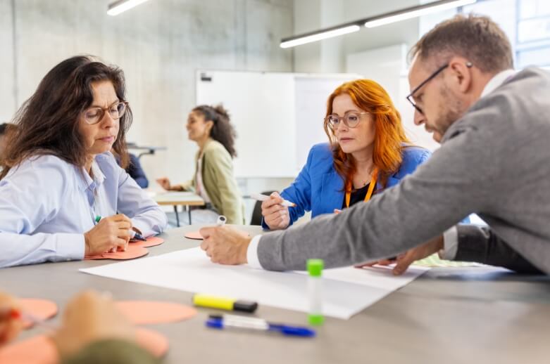 A discussion between a group of people at a table