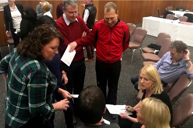 A group of people at a meeting