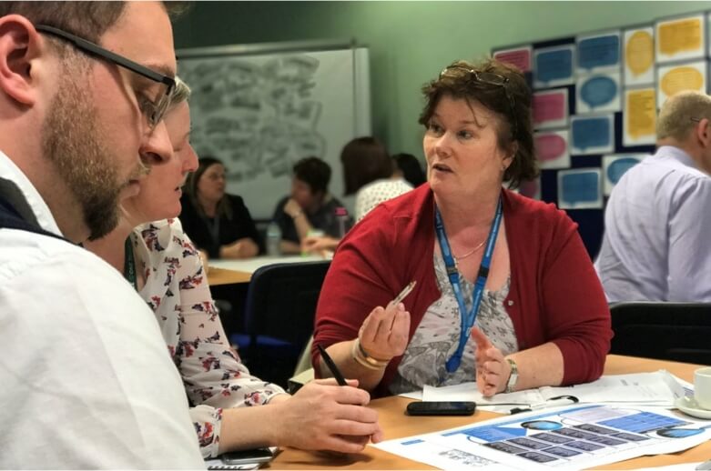 Woman speaking to group