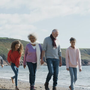 A family walking on the beach together (1)
